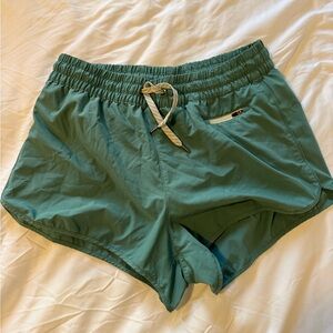 Vuori Women's Athletic Shorts in Teal